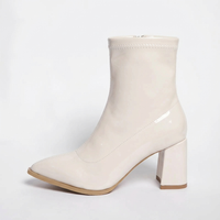 Bottine à talon blanc Synthétique Femme - Santiags blanches vernis chic et modernes 1