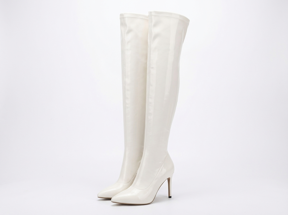 Botte haute blanc Synthétique Femme - Audacieuse santiag blanche à talon aiguille