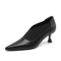 Bottine à talon noir Synthétique Femme - Élégance minimaliste avec courbure sophistiquée 1